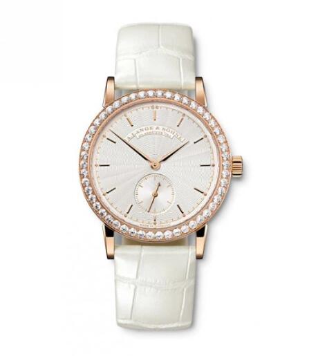 The silvery dial fake watch is decorated with diamonds.